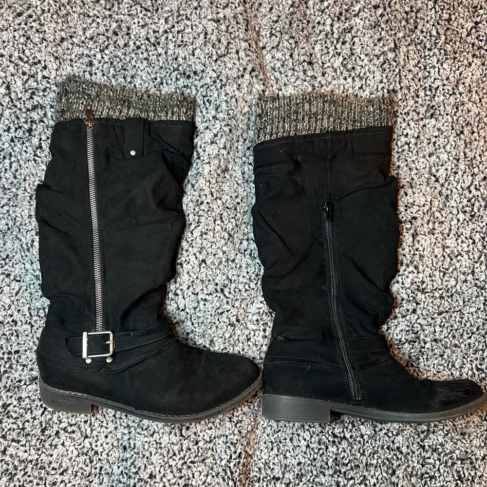 Tall black boots